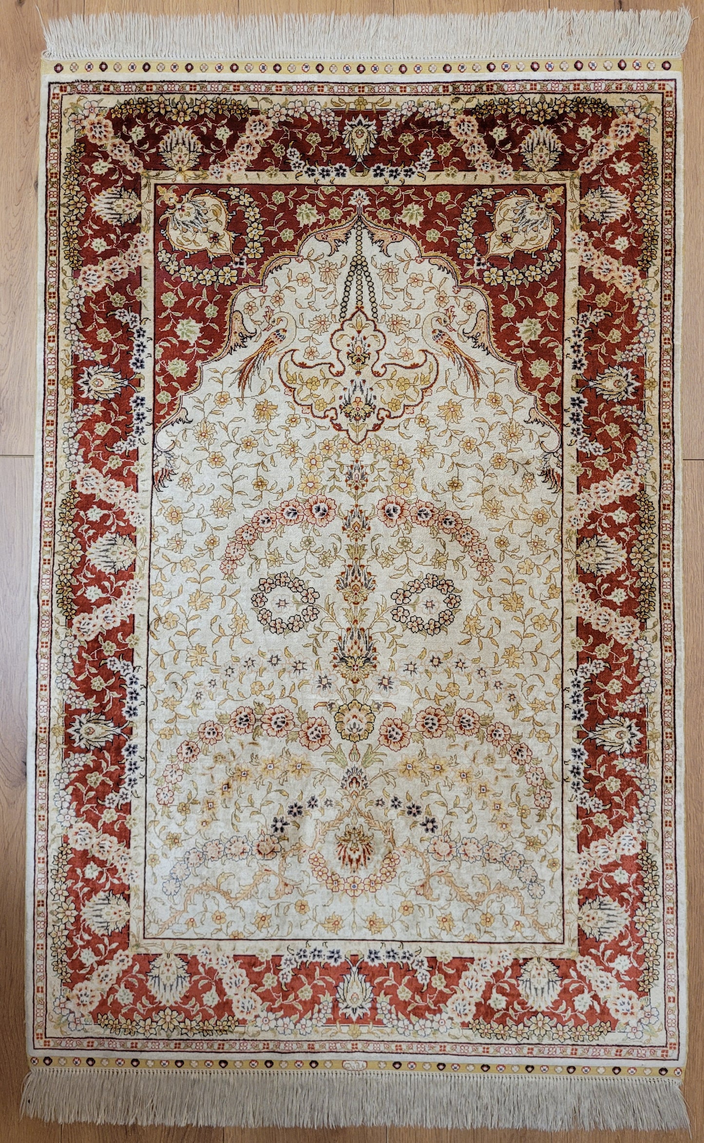 Hereke Teppich Seide auf Seide signiert fein Paradiesvogel Motiv