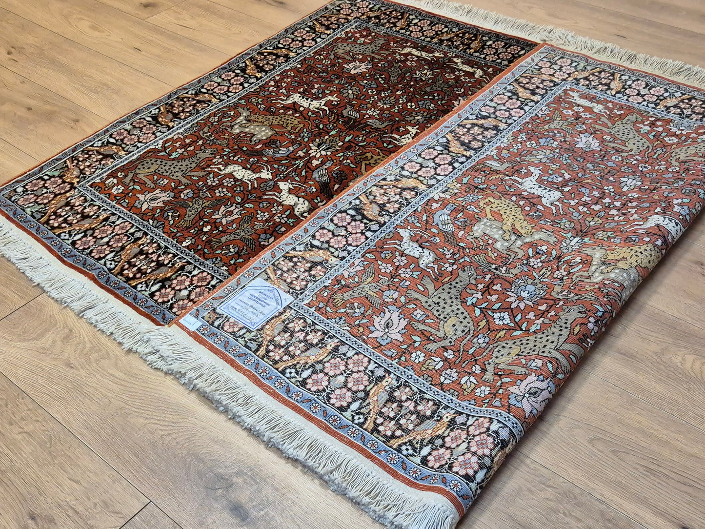 Kashmir Ghom Teppich Naturseide Tiermotiv feine Knüpfung