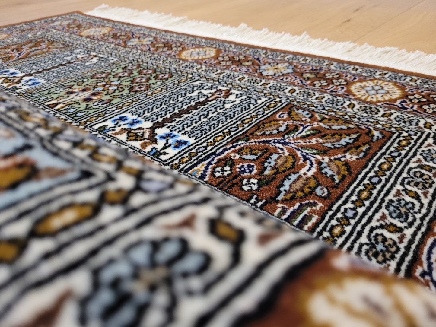 Ghom Teppich Korkwolle Gartenmotiv feine Knüpfkunst