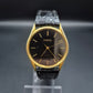 Topol Herren Uhr – Vintage Quarzdesign in Gold-Schwarz (defekt)