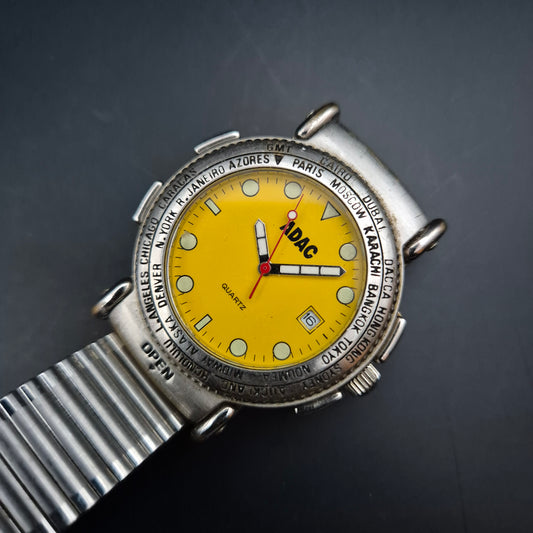 Seltene ADAC Herren Uhr – Gelbes Zifferblatt mit Kompass und Weltzeit
