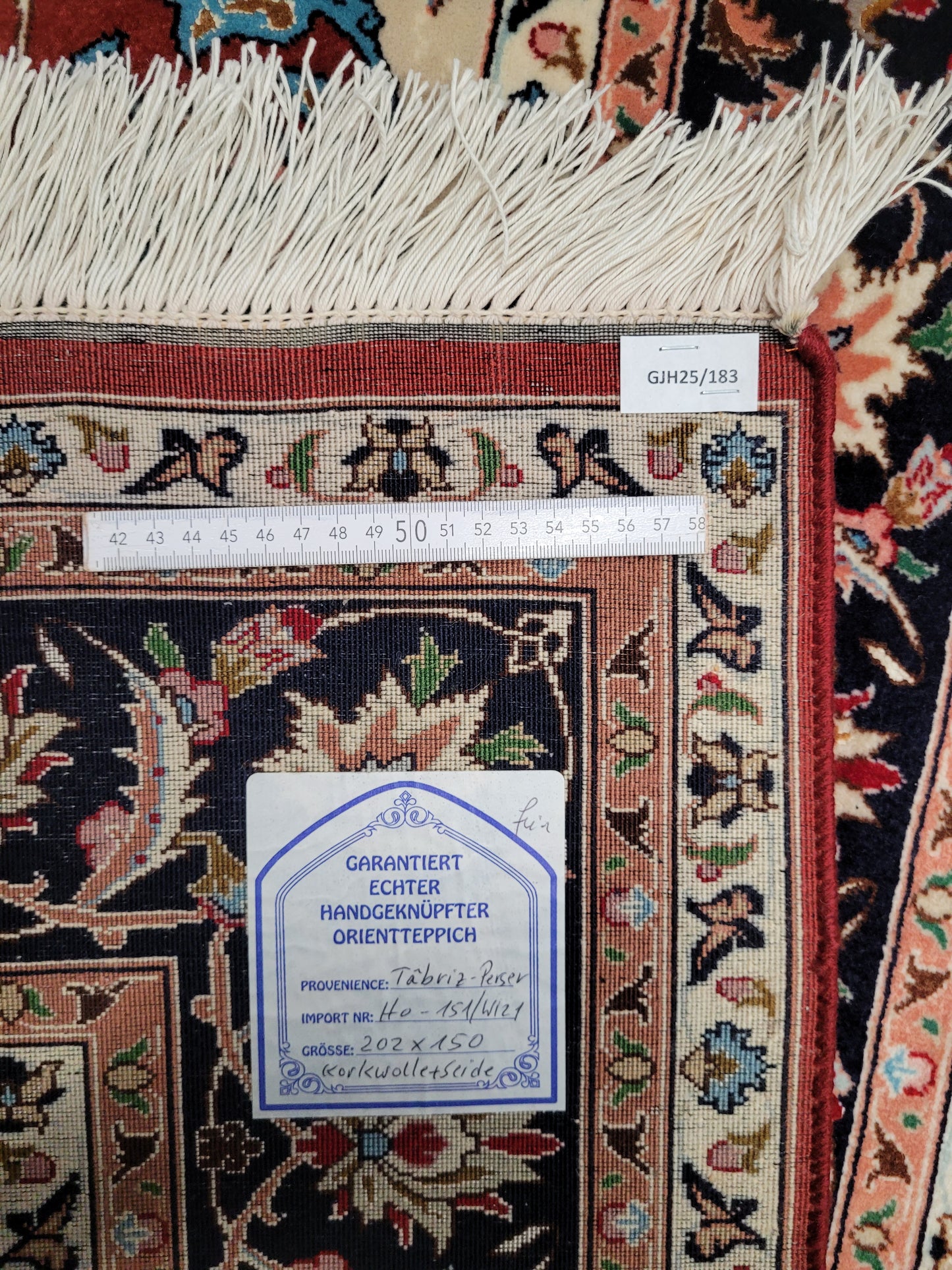 Täbriz Teppich Korkwolle Seide roter Fond feine Knüpfung