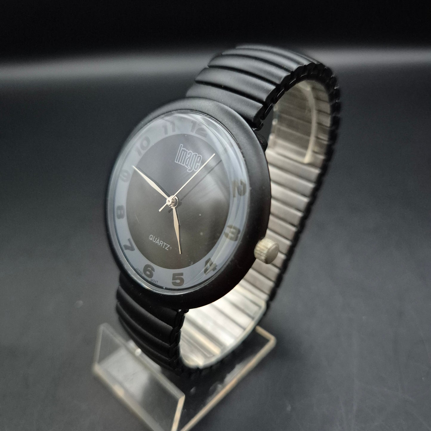 Image Herren Uhr – Schwarzes Design mit Flexband und Kontrastzifferblatt