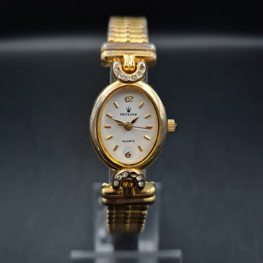 Skyline Damen Uhr – Goldene Vintage Uhr mit Strass und Edelstahlarmband