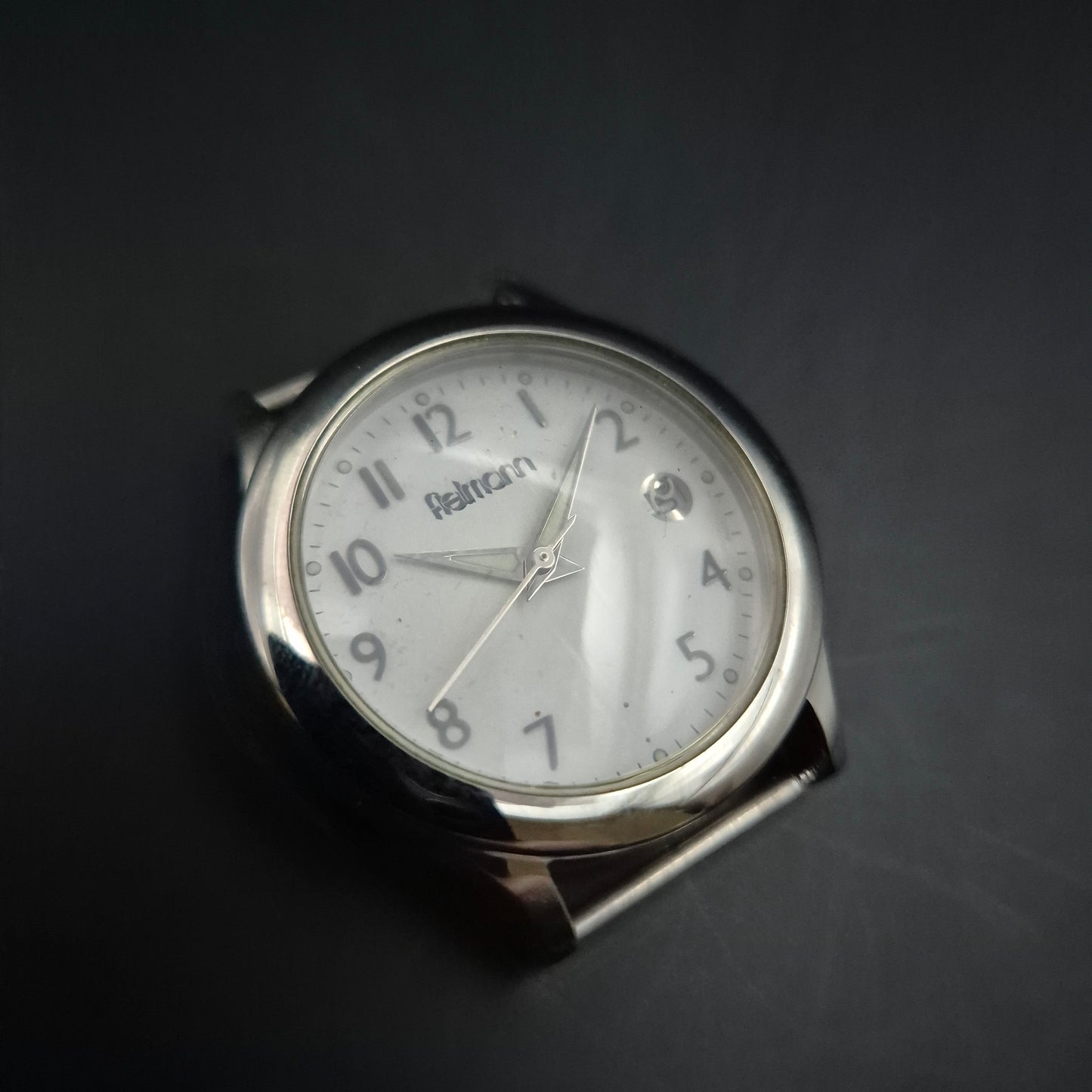 Fielmann Uhr – Edelstahl mit Klappglas & Datumsanzeige