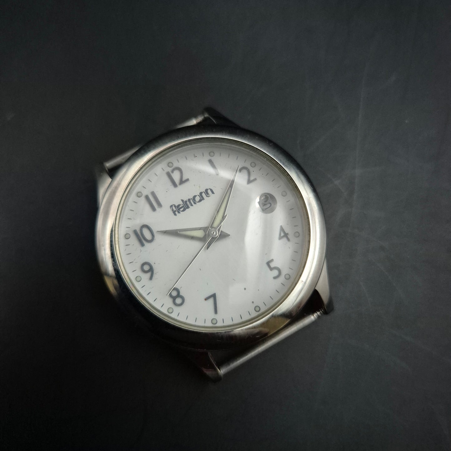 Fielmann Uhr – Edelstahl mit Klappglas & Datumsanzeige