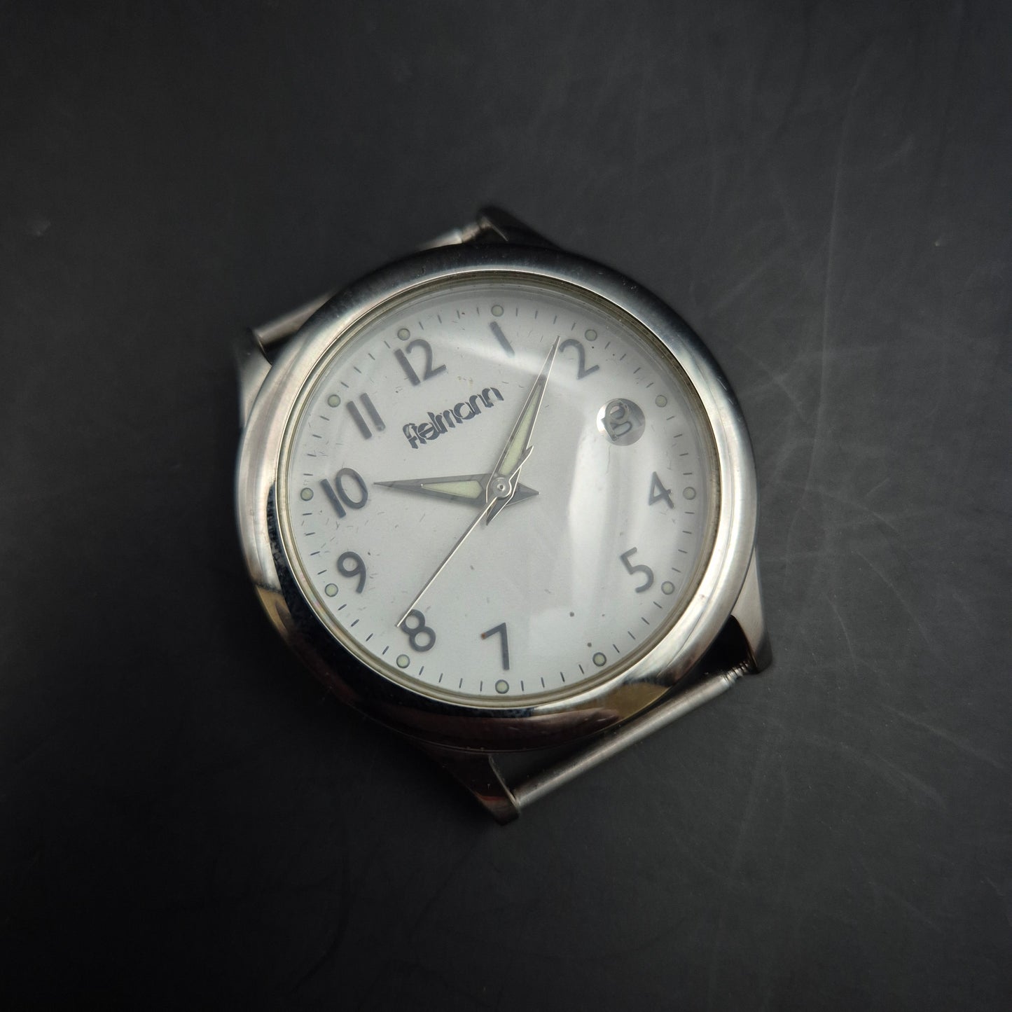 Fielmann Uhr – Edelstahl mit Klappglas & Datumsanzeige