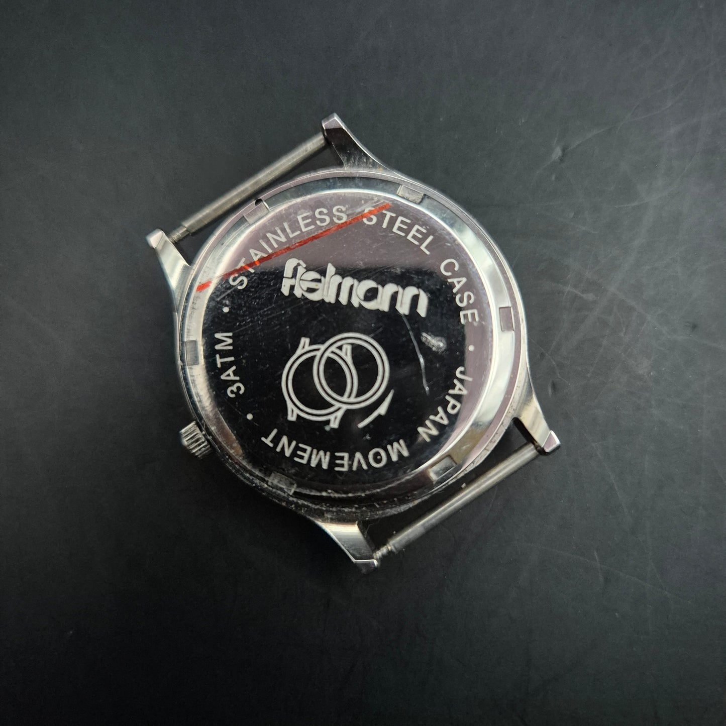 Fielmann Uhr – Edelstahl mit Klappglas & Datumsanzeige