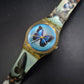 Swatch Damen Uhr mit Schmetterlingsmotiv – Buntes 90er Design