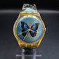 Swatch Damen Uhr mit Schmetterlingsmotiv – Buntes 90er Design