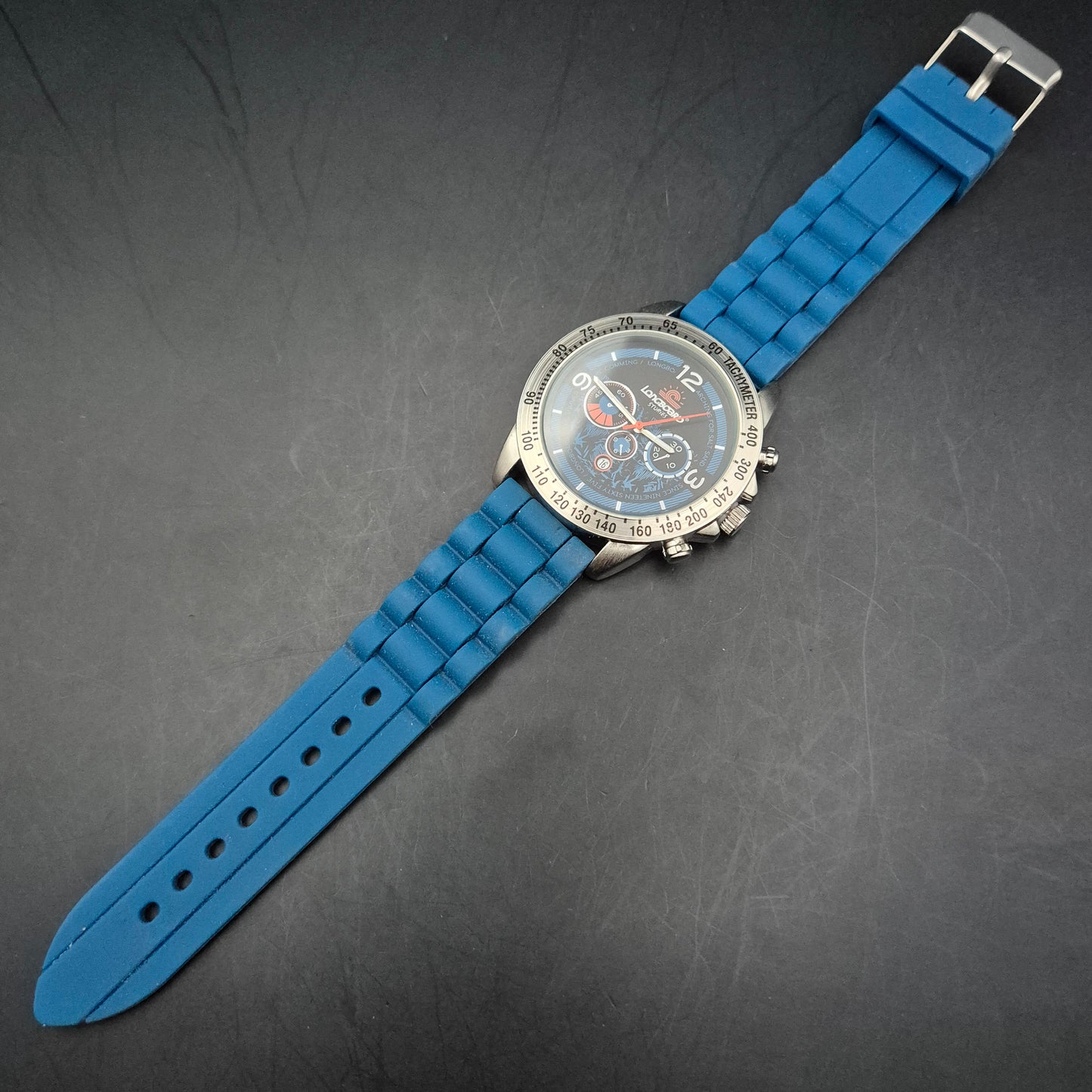 Sportliche Longboard Herren Uhr – Farbenfrohes Design mit Tachymeter-Lünette