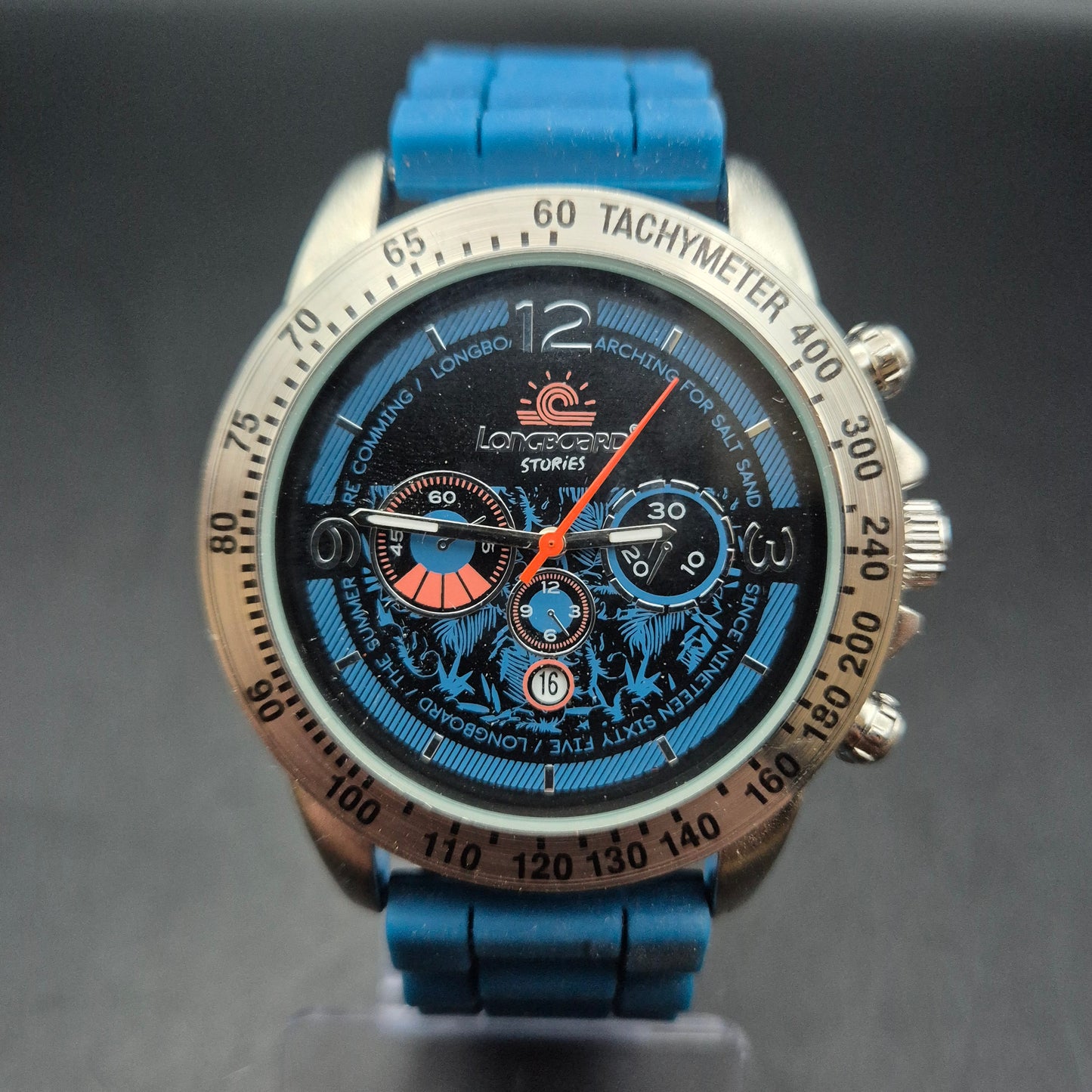 Sportliche Longboard Herren Uhr – Farbenfrohes Design mit Tachymeter-Lünette