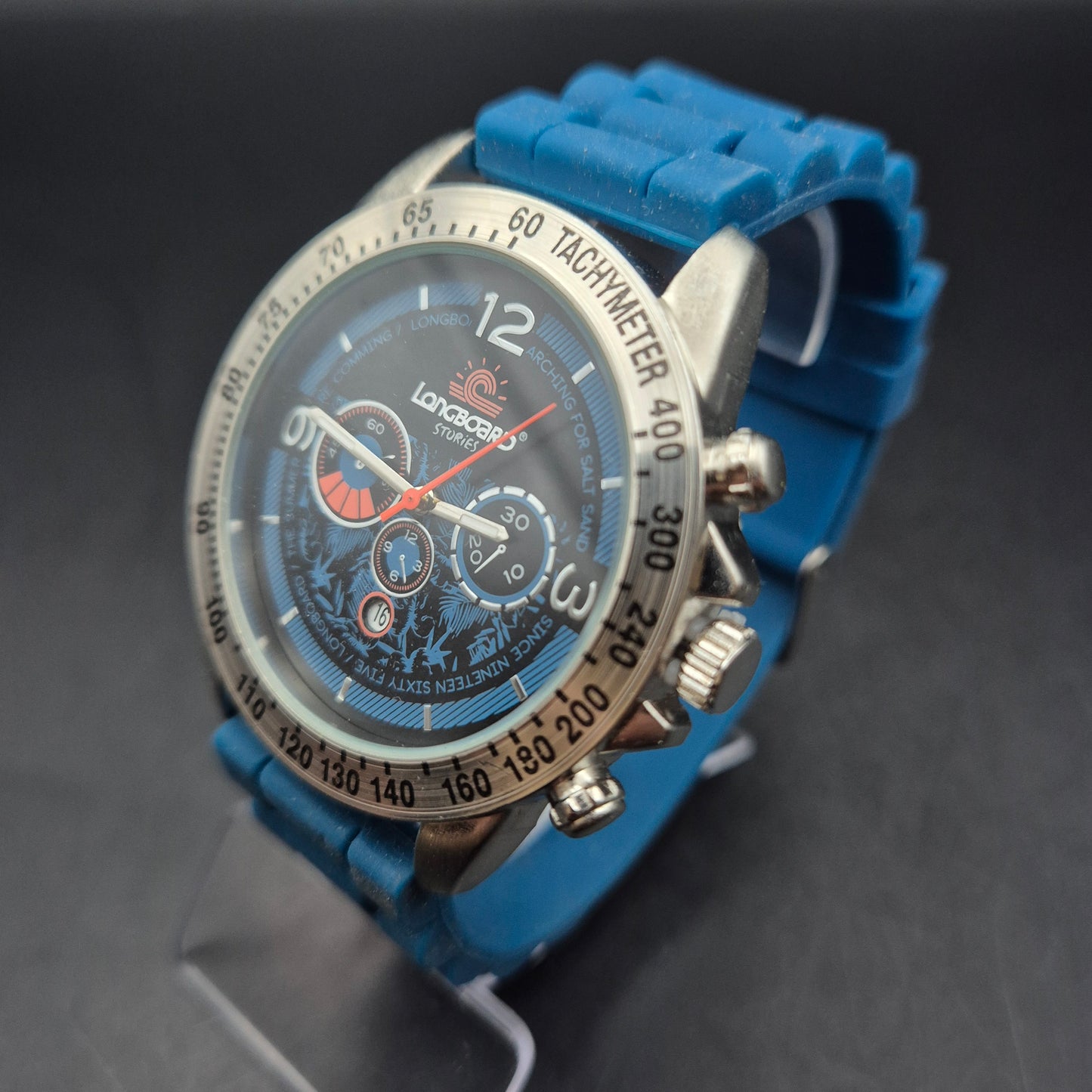 Sportliche Longboard Herren Uhr – Farbenfrohes Design mit Tachymeter-Lünette