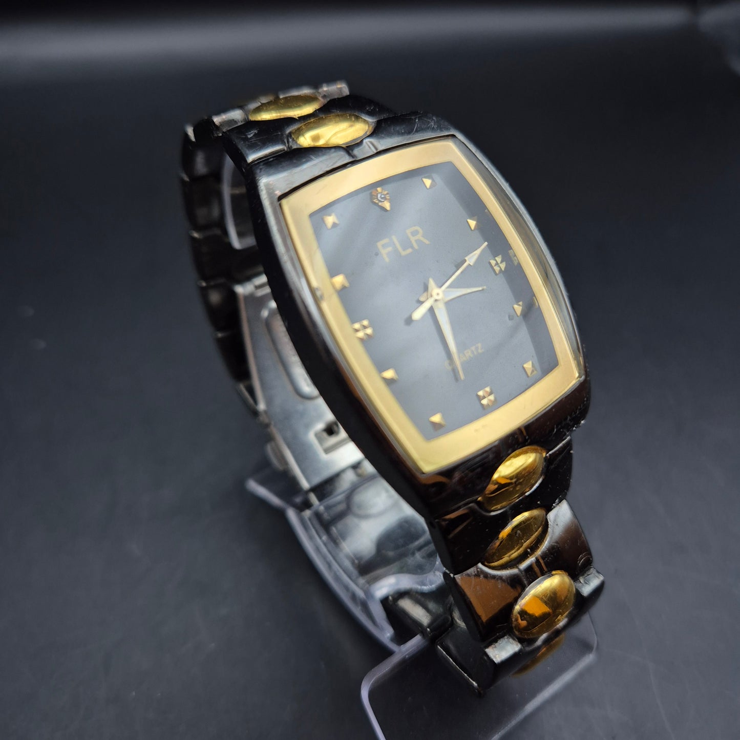 FLR Damen Uhr – Extravagantes Schwarz-Gold Bicolor Quarz