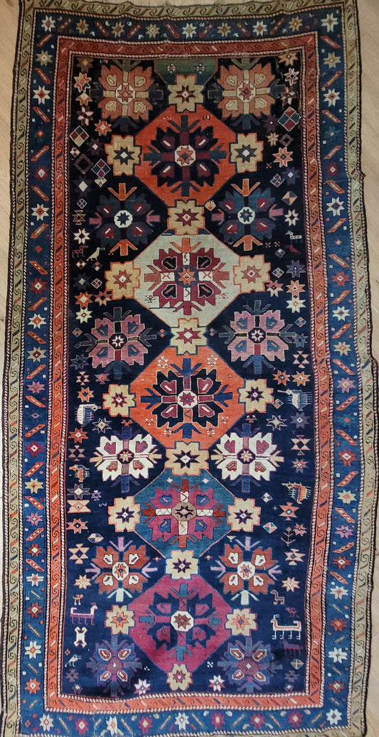 Orientteppich handgeknüpft Kazak antik 264x130 cm