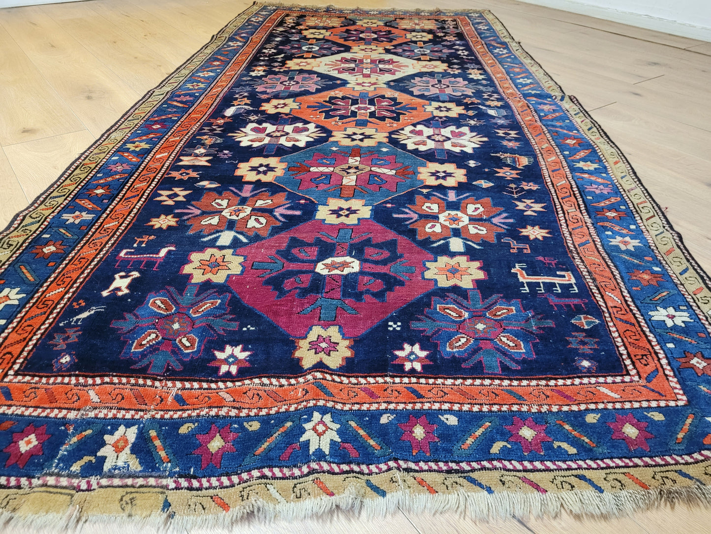 Orientteppich handgeknüpft Kazak antik 264x130 cm