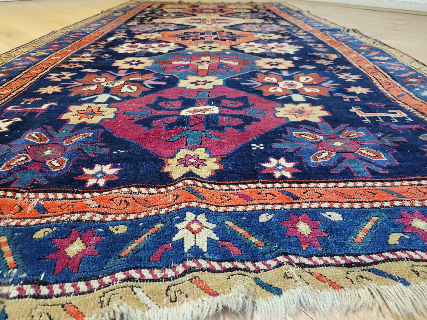 Orientteppich handgeknüpft Kazak antik 264x130 cm