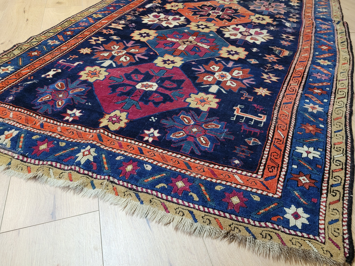 Orientteppich handgeknüpft Kazak antik 264x130 cm