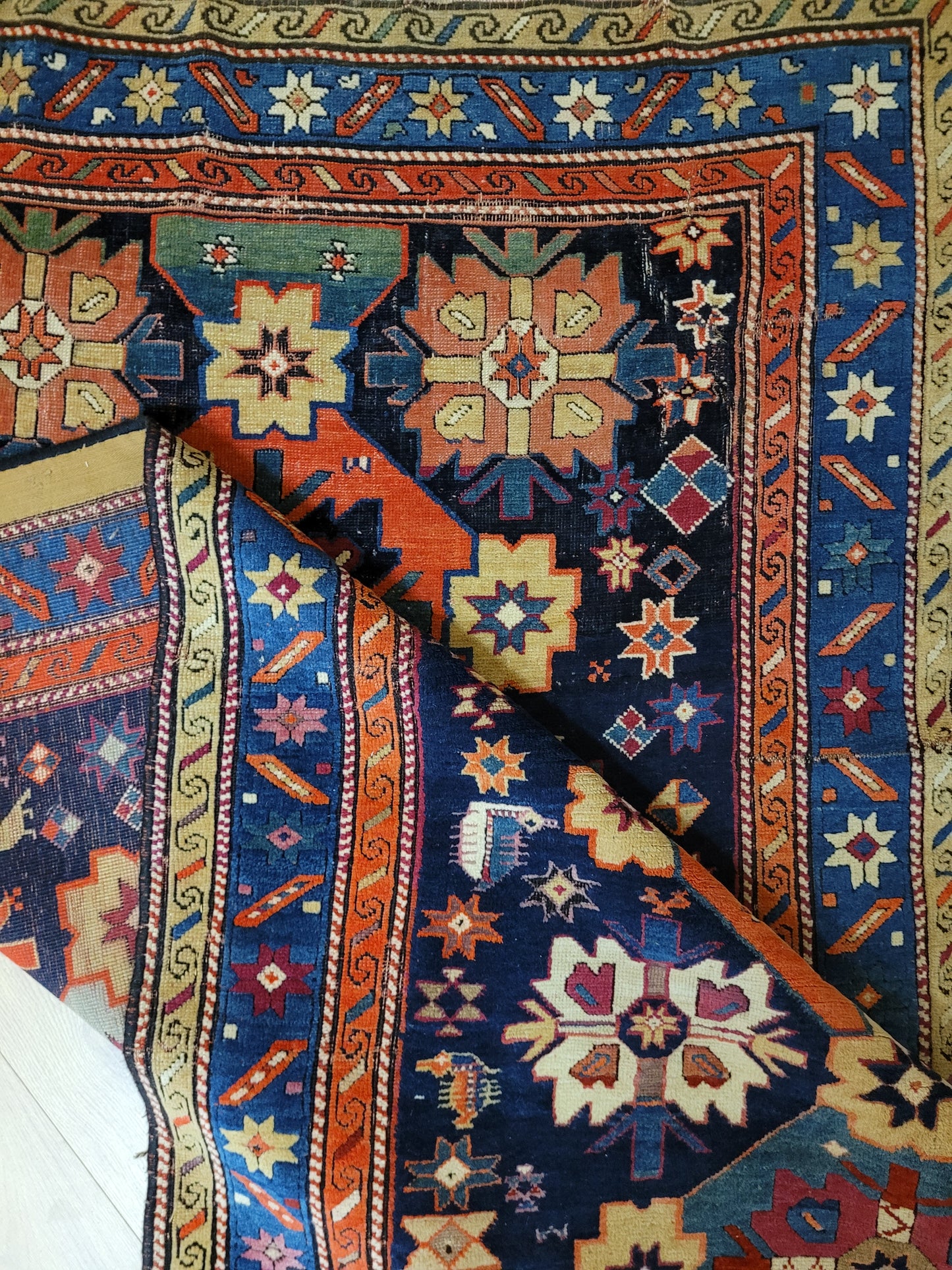 Orientteppich handgeknüpft Kazak antik 264x130 cm