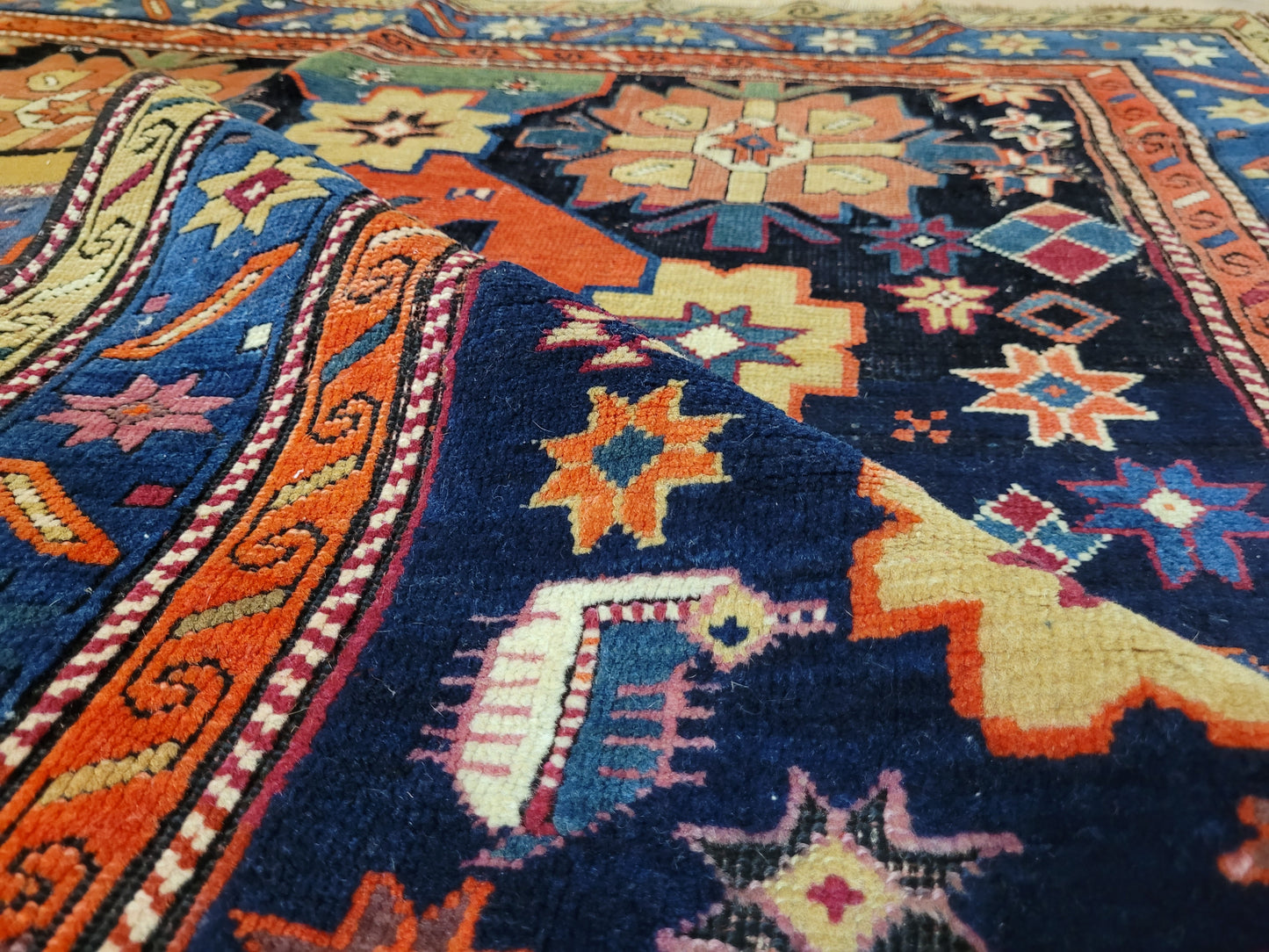 Orientteppich handgeknüpft Kazak antik 264x130 cm