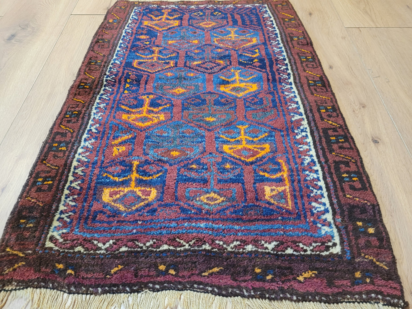Orientteppich handgeknüpft Belutsch 83x56 cm