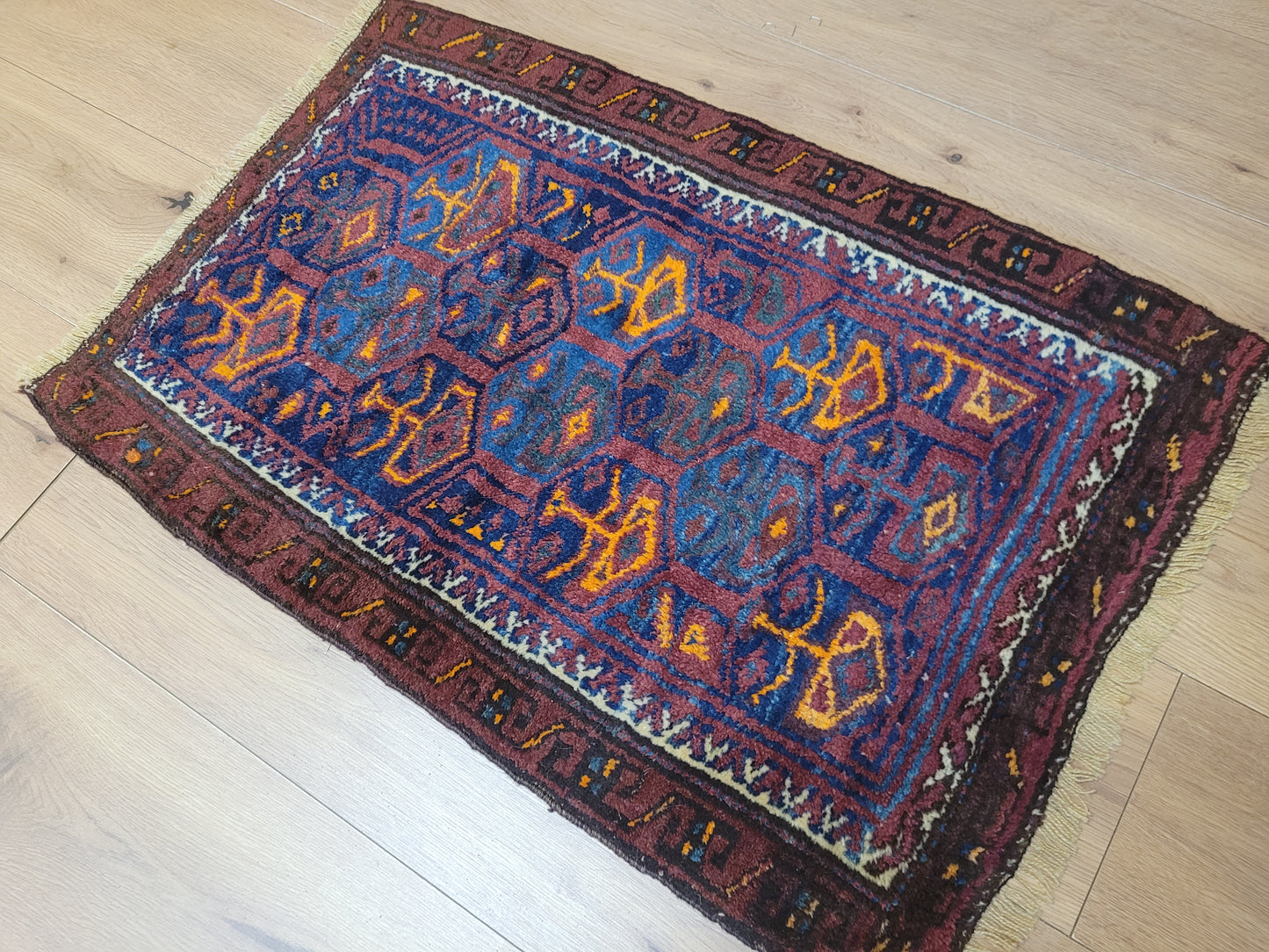 Orientteppich handgeknüpft Belutsch 83x56 cm