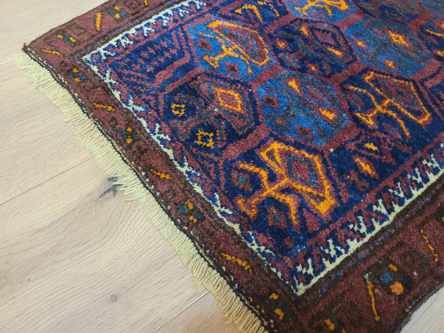 Orientteppich handgeknüpft Belutsch 83x56 cm