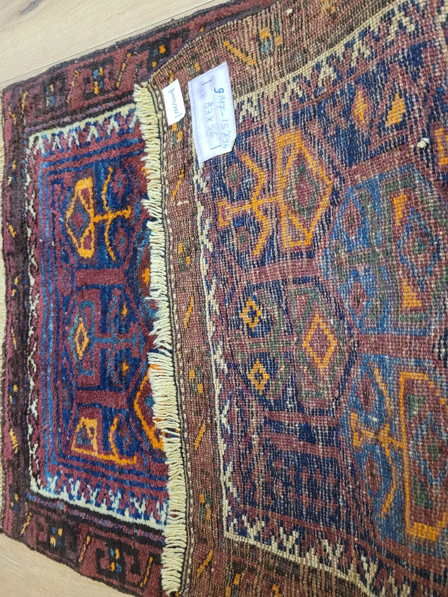 Orientteppich handgeknüpft Belutsch 83x56 cm