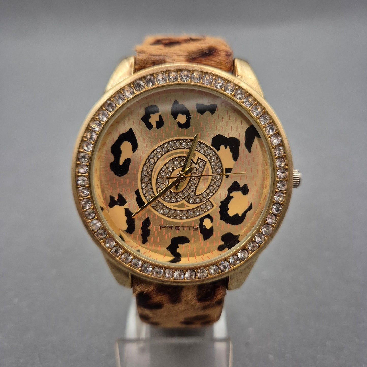 Auffällige Damen Uhr mit Leopardmuster und Strassbesatz