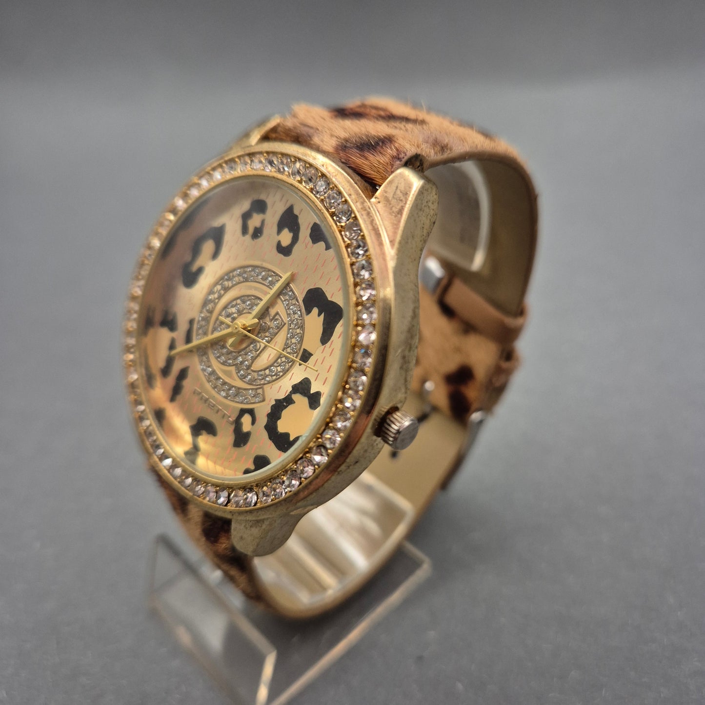 Auffällige Damen Uhr mit Leopardmuster und Strassbesatz