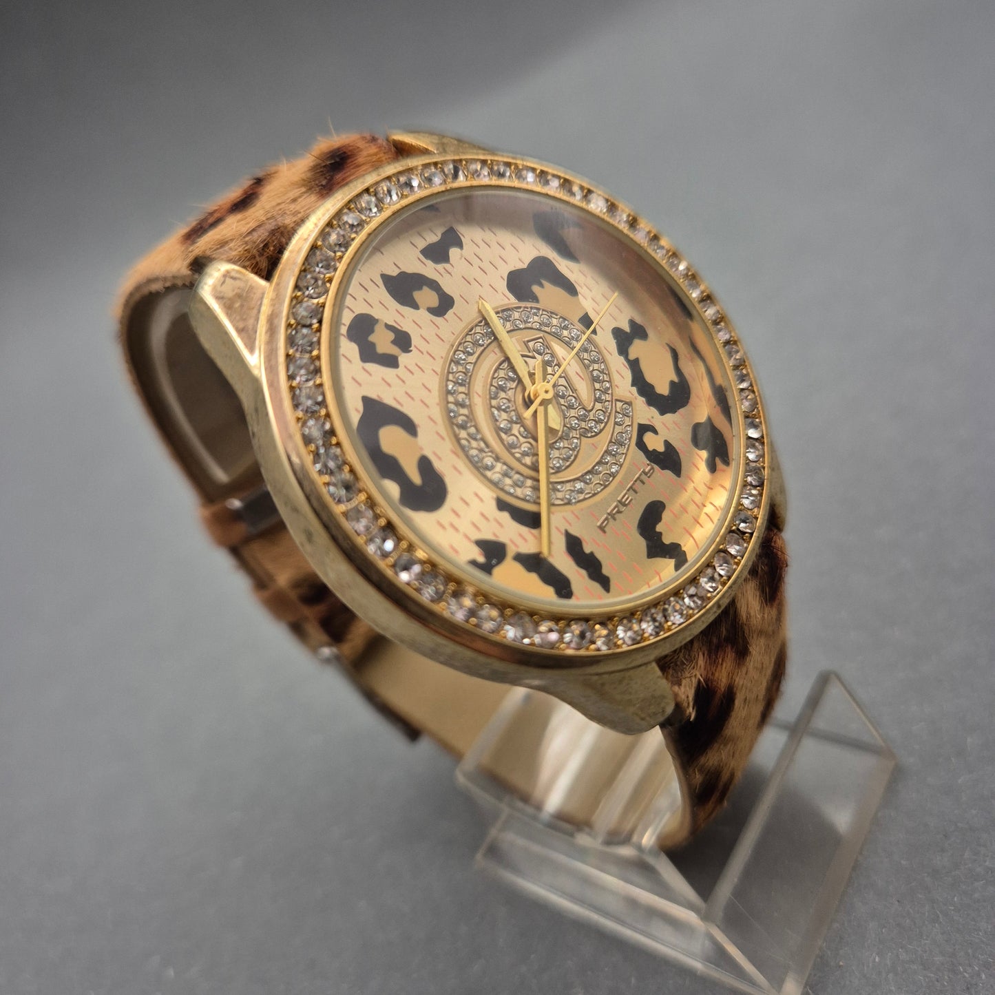 Auffällige Damen Uhr mit Leopardmuster und Strassbesatz