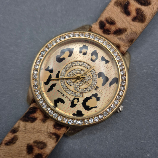 Auffällige Damen Uhr mit Leopardmuster und Strassbesatz