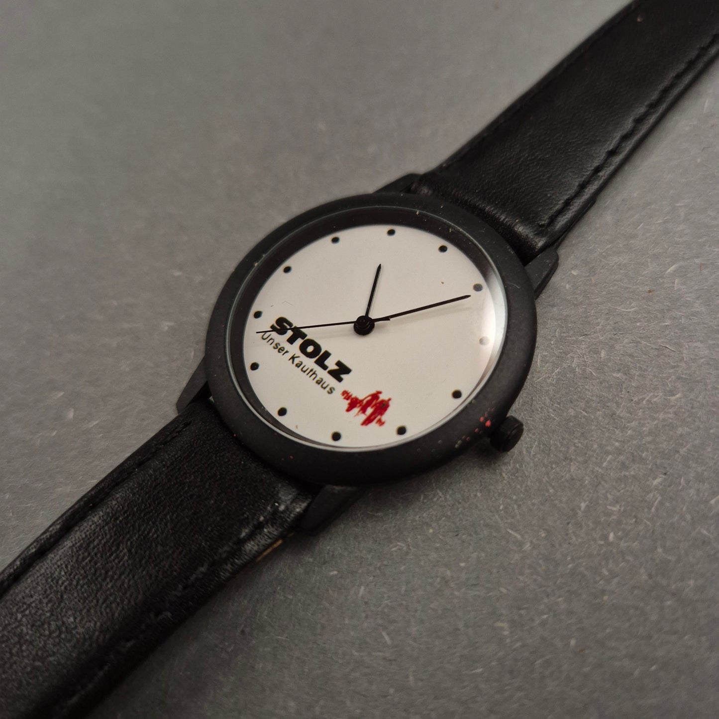 Werbe Herren Uhr „Stolz – Unser Kaufhaus“ im schlichten Design