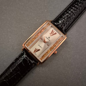 Elegante ROMAND Damen Uhr – Roségold & Seitenbesatz