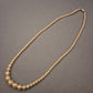 Elegante Perlenkette – Verlaufende Perlen für Vintage-Charme