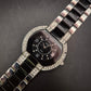 Elegante Damen Uhr mit schwarzem Zifferblatt und Strassbesatz