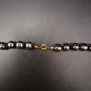 Elegantes Hämatit-Collier – Glänzende Steinkugeln in Schwarz-Metallic