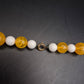 Bunte Perlenkette – Gelb-Weiße Kombination mit runden Kugelperlen