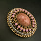 Opulente Vintage Brosche – Goldfarben mit rosa Steinbesatz