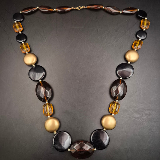 Moderne Kette mit großen Glas- und Acrylperlen in Braun-Gold-Optik