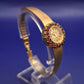 Vintage Slava Damen Uhr – Goldfarben & Granatbesatz