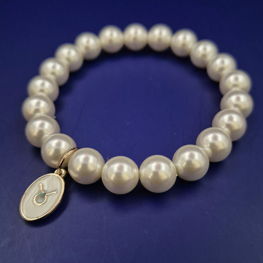 Elegantes Perlen Armband mit Stier-Anhänger – Zierlich und symbolstark