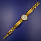Elegante Cathay Damen Uhr – Goldfarbenes Armreif-Design mit römischen Ziffern