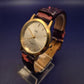 Elegante MC Damen Uhr – Gold-Optik mit markantem Lederarmband