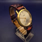 Elegante MC Damen Uhr – Gold-Optik mit markantem Lederarmband