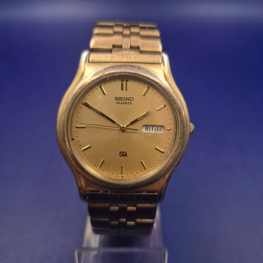 Klassische Seiko Herren Uhr – Goldfarbenes Vintage Design mit Tag/Datum