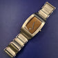 Titel Elegante DKNY Herren Uhr – Klassisches Design in Silber & Braun