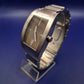 Titel Elegante DKNY Herren Uhr – Klassisches Design in Silber & Braun