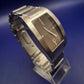 Titel Elegante DKNY Herren Uhr – Klassisches Design in Silber & Braun