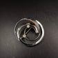 Silberfarbene Brosche im Spiral-Design – Eleganter Vintage-Schmuck mit Stein